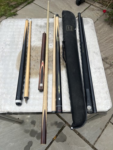 Snooker and pool cues - and,
